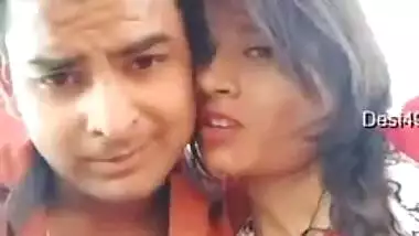 Handsome young man paws Indian's perfect boobs through red dress