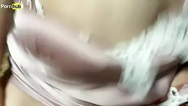 Stepmother and stepson share a bed in a hotel room.