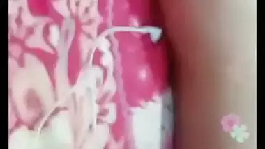 Desi gal grabs camera in time to record how she rubs own XXX pussy