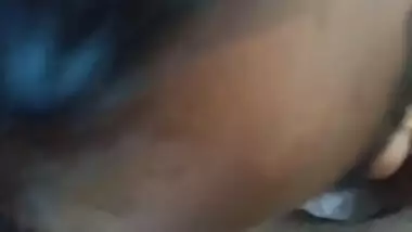 Semi-nude maid sucking dick like a pro